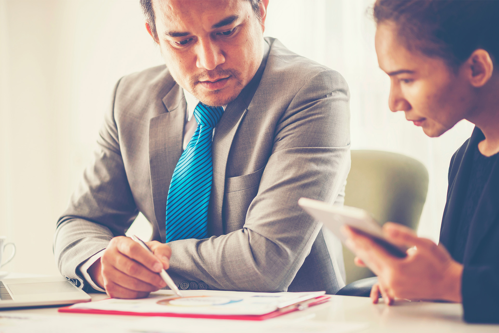 Two business people closing a deal